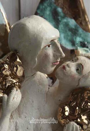 ANIOŁY  SPLECIONE W SZUMIE FAL