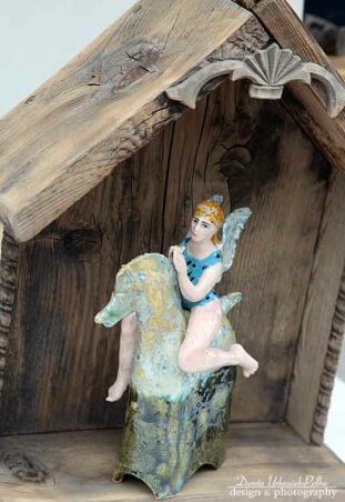 ANIOŁ I CZARNE GROSZKI