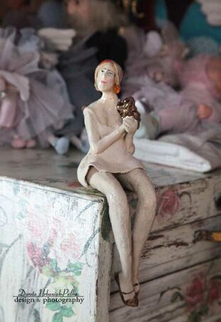 DZIEWCZYNA ZE ZŁOTĄ MUSZLĄ