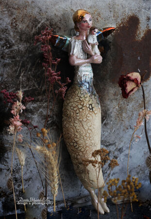 ZŁOTOWŁOSY ANIOŁ  Z DZIECKIEM