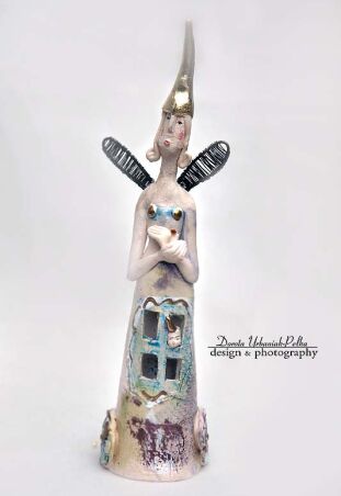 PUDROWANA NIEWINNOŚĆ Z PTASZKIEM W ZAMYŚLE MOBILNA