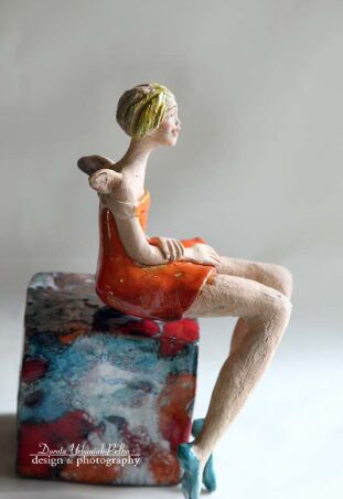 DELIKATNY W POMARAŃCZACH